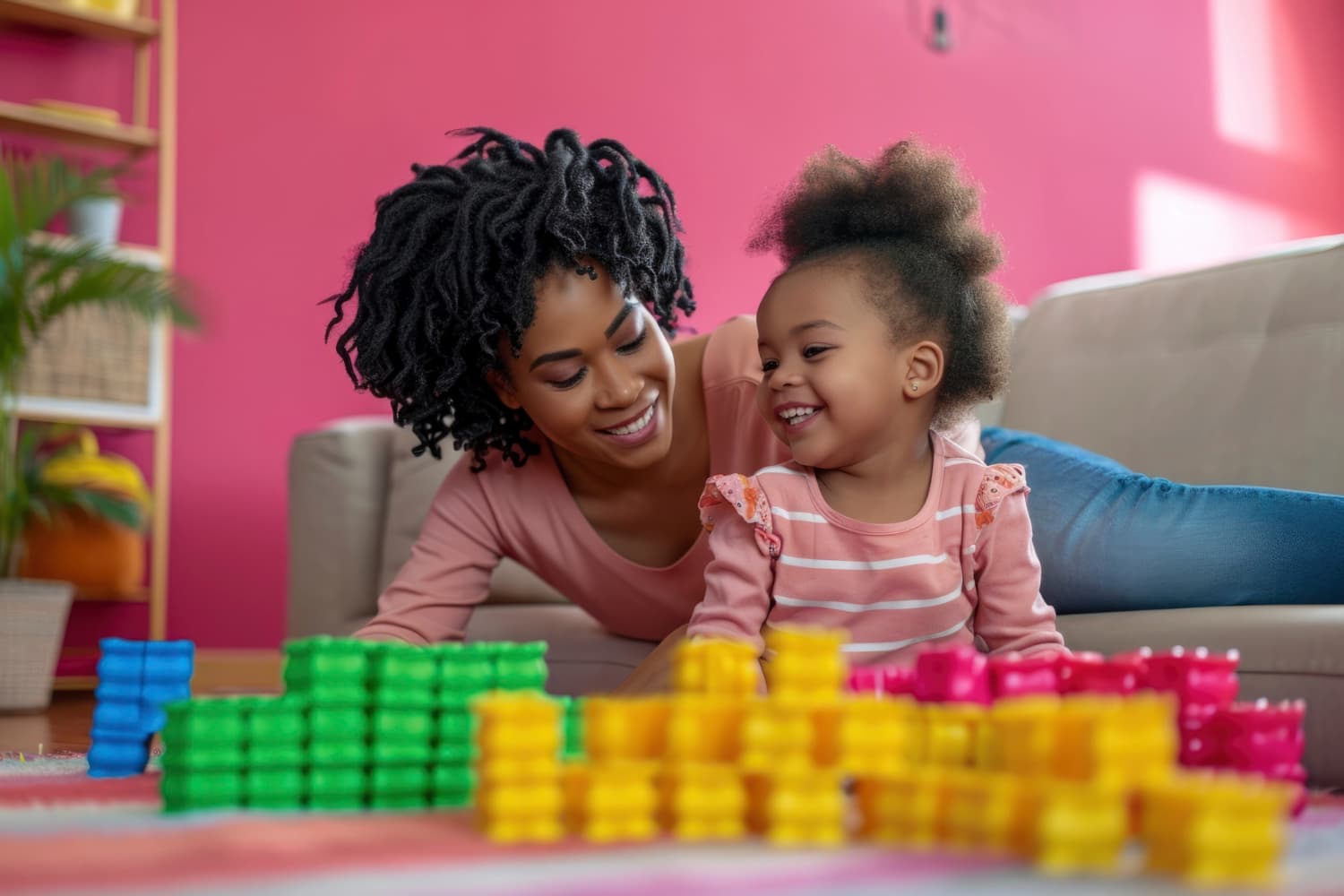 Two children laughing together.